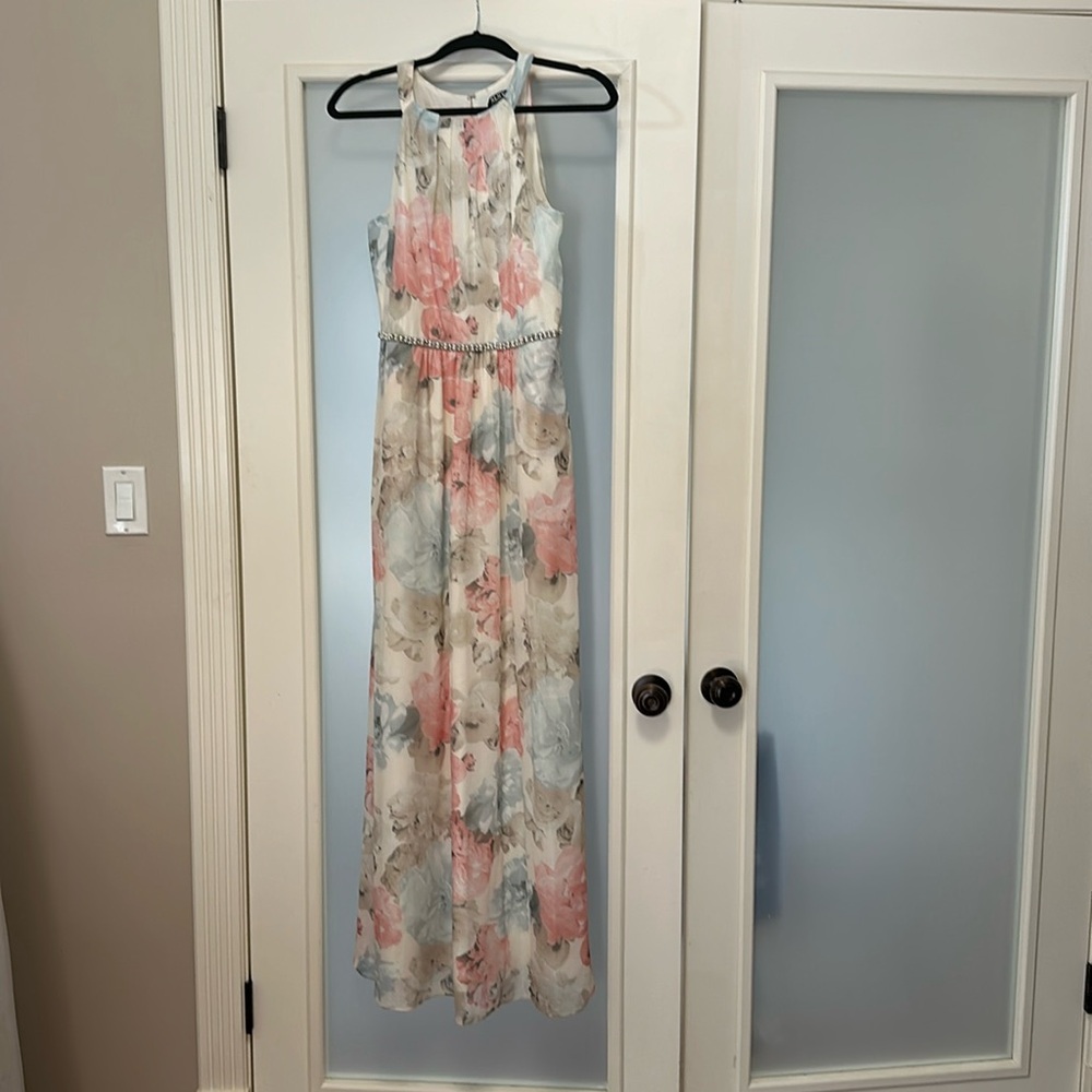 Long floral gown. Beaded waist detail